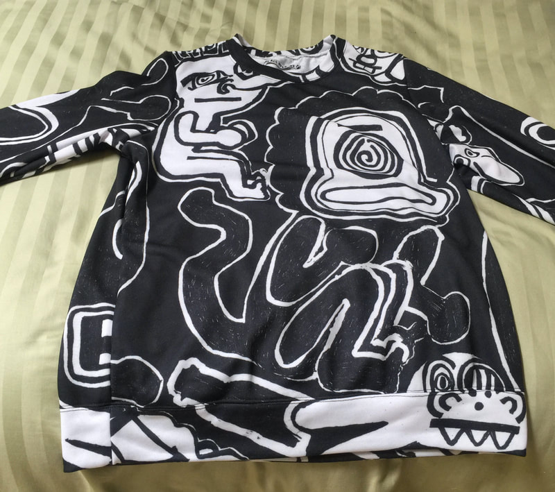 Black and white graphic sweatshirt with imagery from painting by Quinn Marston.