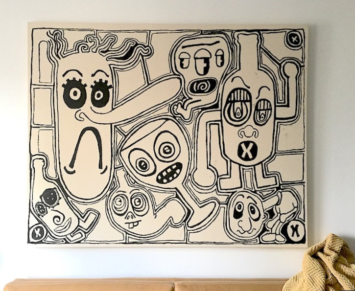 Large black and white graphic contemporary painting by Quinn Marston installed over collector's couch.